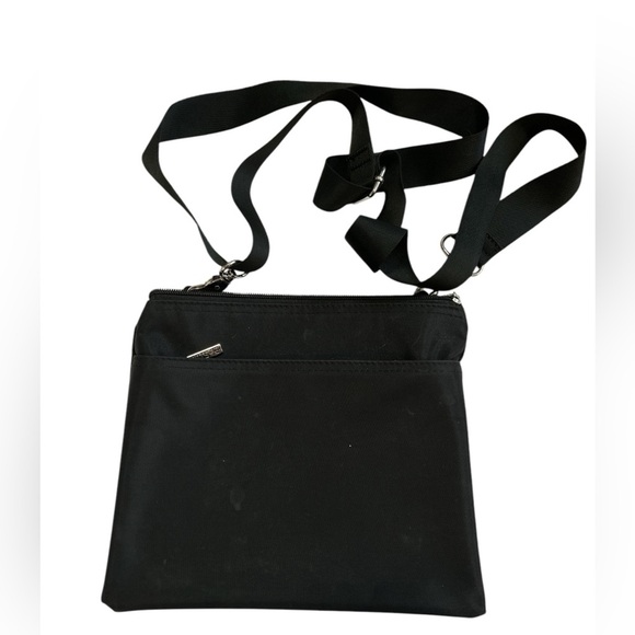 Roots Handbags - 3 For 25 Black Eastpak Crossbody Bag